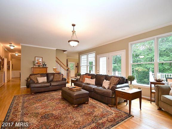 Family Rm Beautiful Wood Floors and Windows Galore