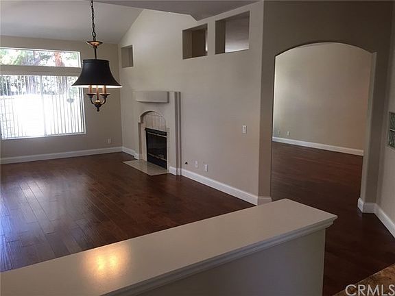 View from Foyer into Living Room and Family Room