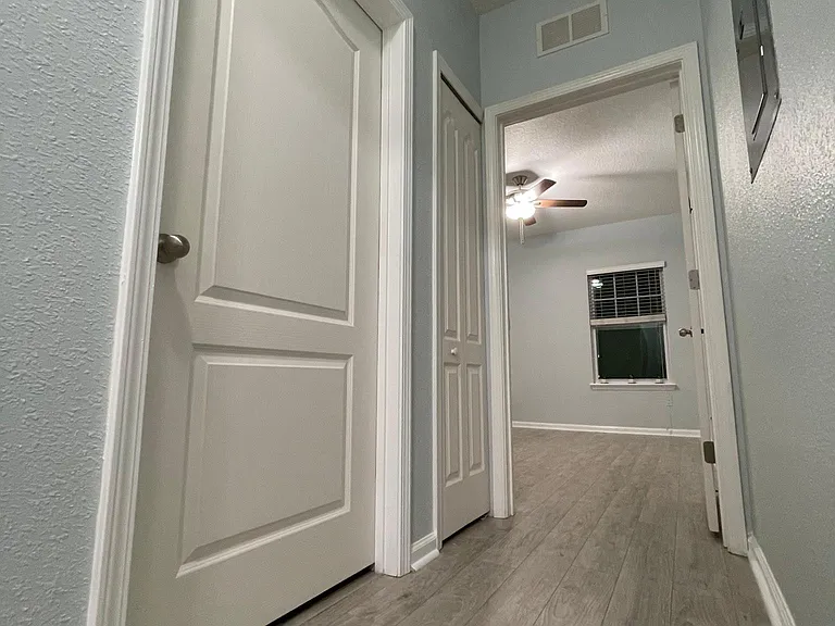 Separate hallway for second bedroom and second bathroom.
