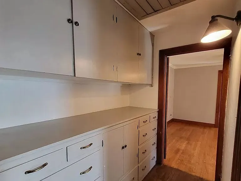 Built in storage across from main bathroom.