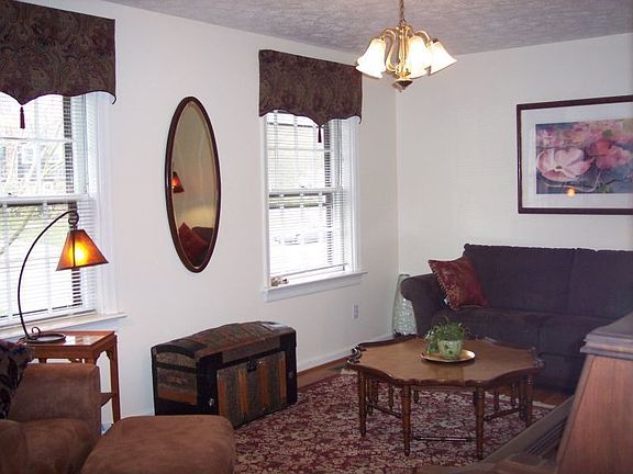 Formal living room with wood floors