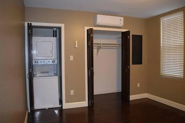 Spacious bedroom with closet and W/D unit