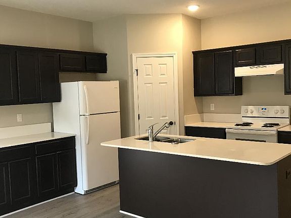 Kitchen with island and pantry