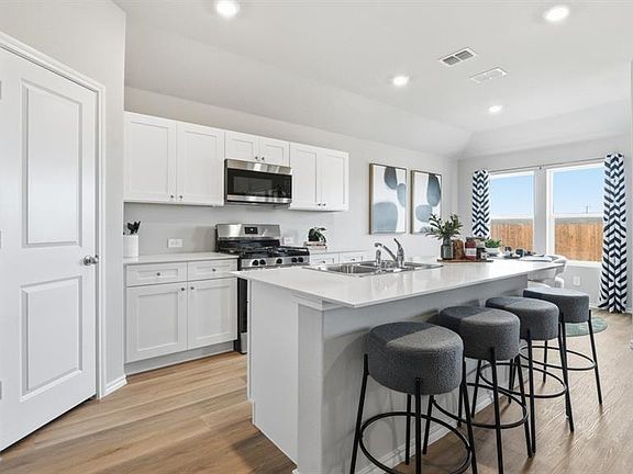 Kitchen-All Home and community information, including pricing, included features, terms, availability and amenities, are subject to change at any time without notice or obligation. All Drawings, pictures, photographs, video, square footages, floor plans, elevations, features, colors and sizes are approximate for illustration purposes only and will vary from the homes as built.