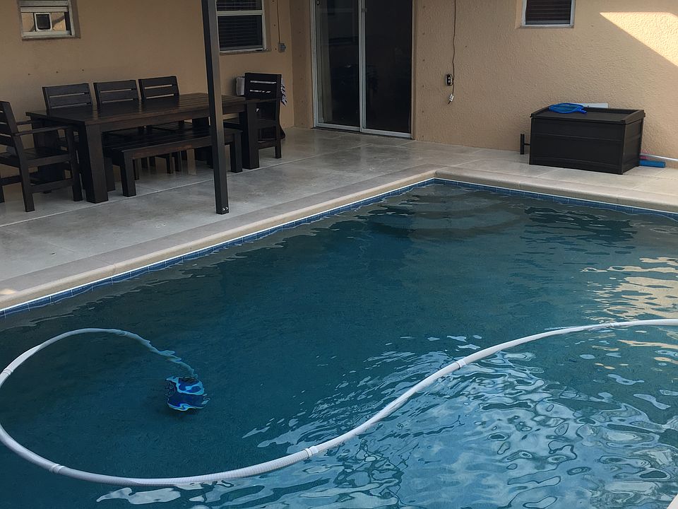 Screened in pool with solar