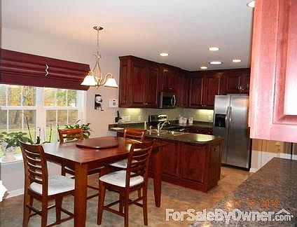 Kitchen and Dining Area
						:
						Custom cabinets