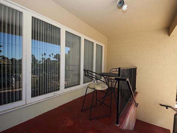 Stair Entryway to front door. Perfect place for morning coffee with a peak ocean view.