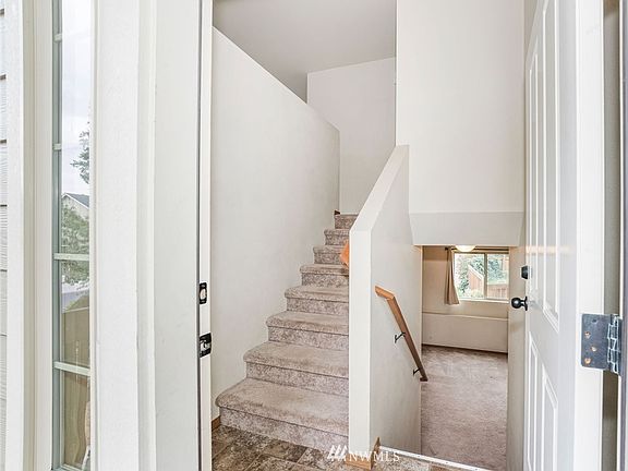 Split level entry. Upstairs leads to living room, kitchen, and two bedrooms. Downstairs leads to family room and 3rd bedroom. 