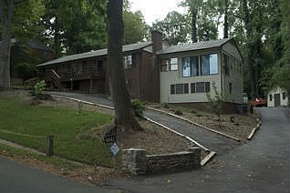Front of house with culesac front driveway