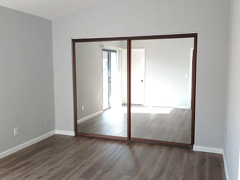 second master suite with vaulted ceiling