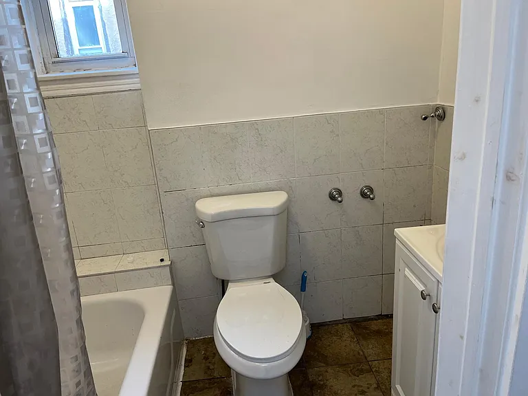 Newer vanity, mirror and toilet