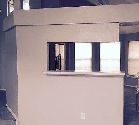 Living area looking into kitchen