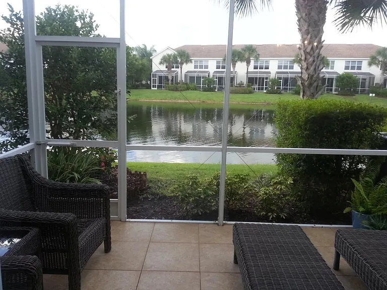 Screened lanai with lake view