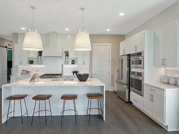 Kitchen with island and pendant lighting