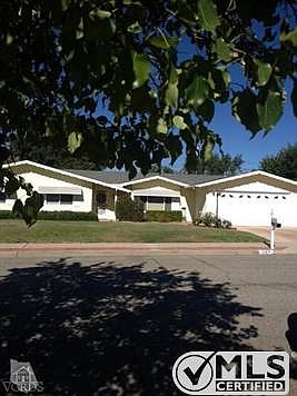 Lovely tree lined street.  Sunny three bedroom home with two car garage.  Work bench and some tools included.