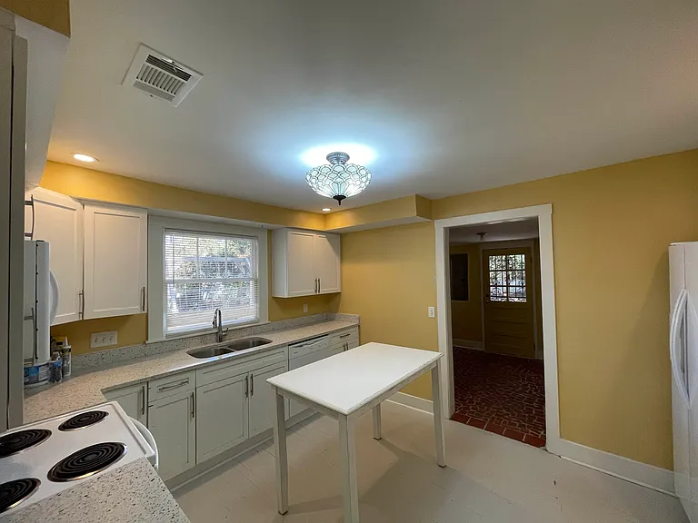All-electric kitchen includes a dishwasher and pantry.