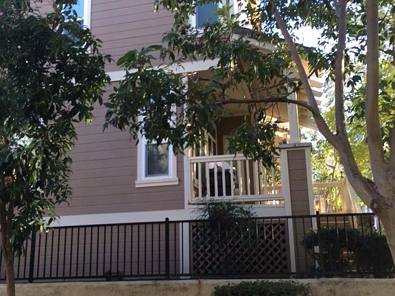 Side of townhome showing end unit location and abundant wind