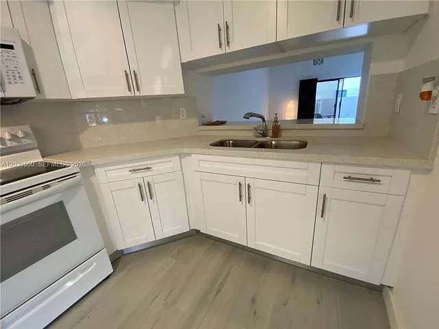 8807 SW 130th Pl #102 — Photo 16
