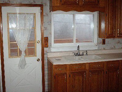 Kitchen with exit to yard