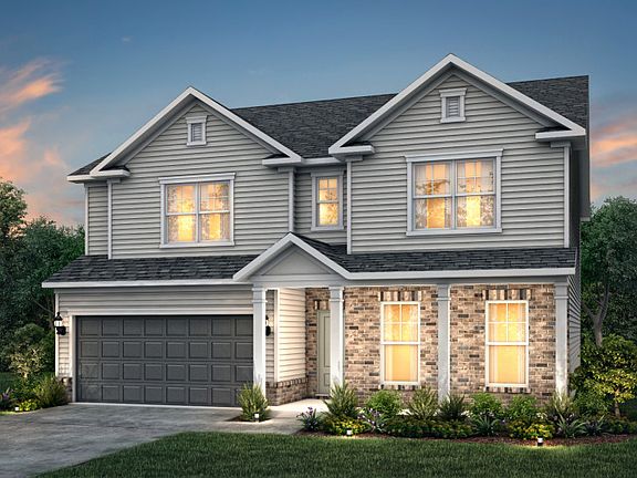 Mitchell Exterior LC2N features siding, brick, covered front porch and 2 car front load garage