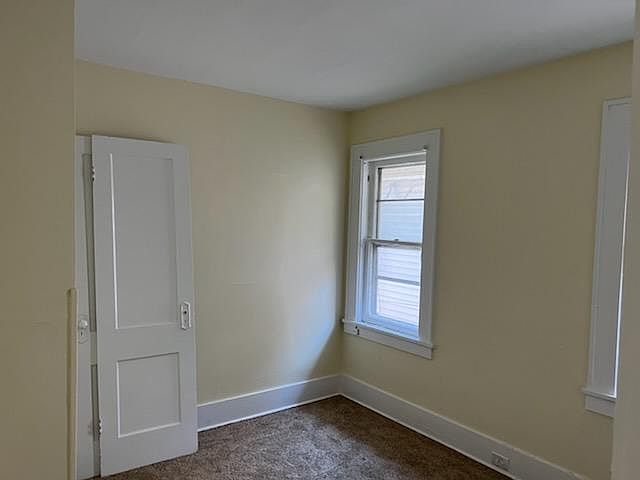 East bedroom, freshly painted and with new nylon carpeting