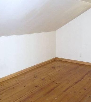 Upstairs bedroom-knotty pine floors!