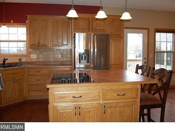 French door stainless steel refrigerator, warm wood floors, central vacuum.