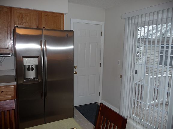 Fridge and patio on right