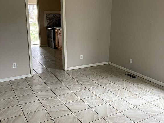 Living room looking into kitchen.