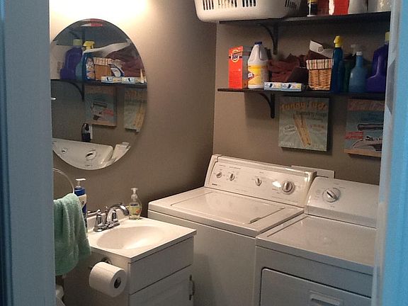 Half bath and laundry off kitchen