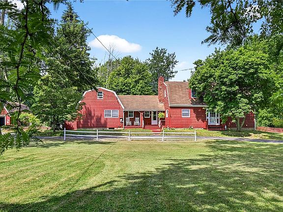 This home sits on 18 acres of scenic wooded land