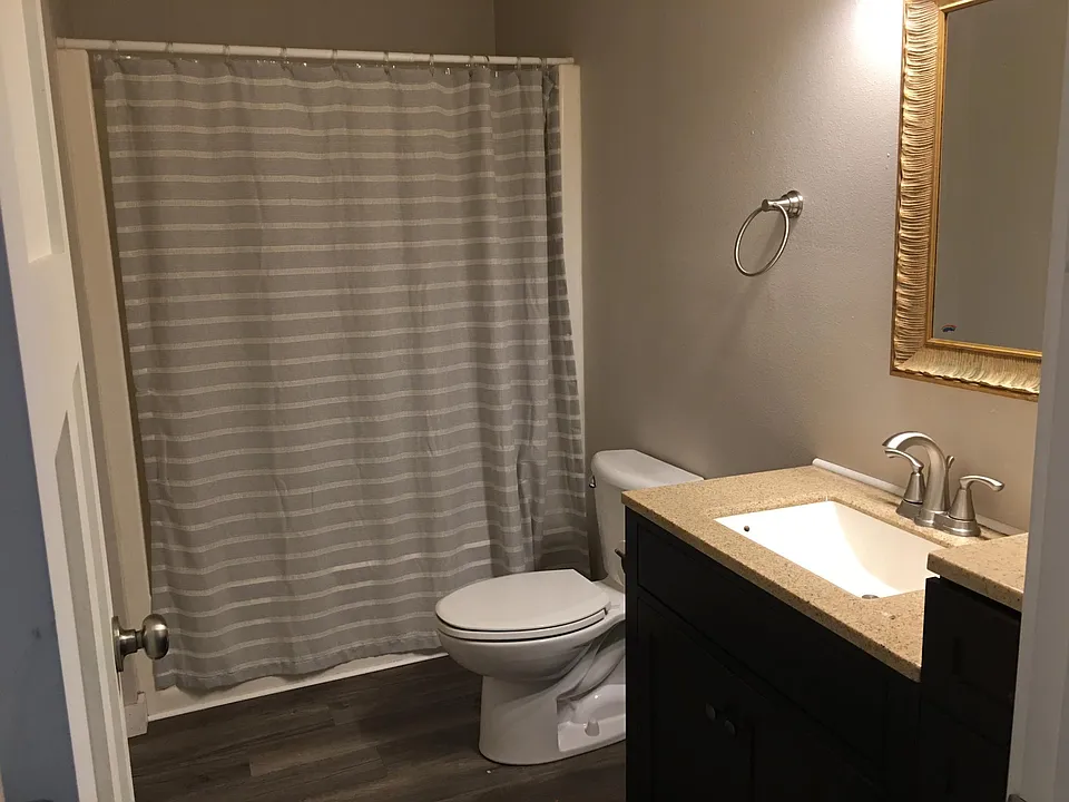 Upstairs bathroom. Large linen/storage nook inside this bathroom, with tub/shower.
