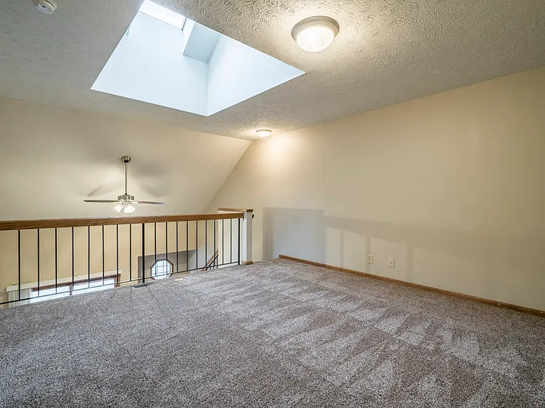 Loft-style homes feature a cozy bonus room ideal for a reading nook, home office, or whatever inspires you.