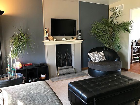 Living room w/faux fireplace