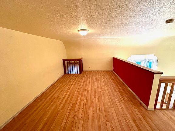 Loft area overlooking the kitchen.