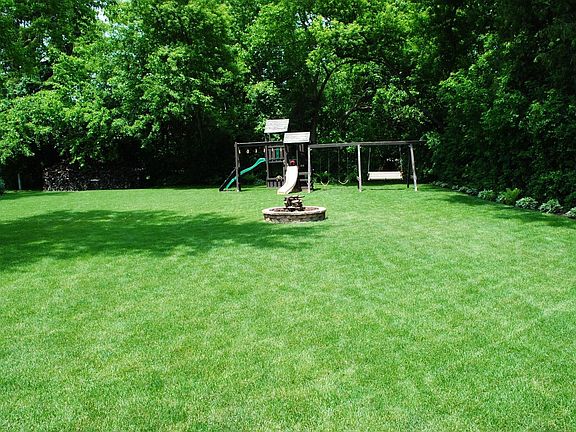 Huge playset in back yard