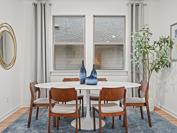 Dining Area in the Oak home plan by Trophy Signature Homes - REPRESENTATIVE PHOTO
