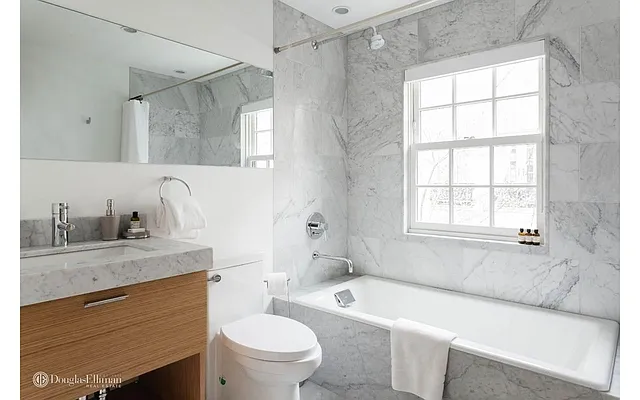 Sold by Douglas Elliman | media 18