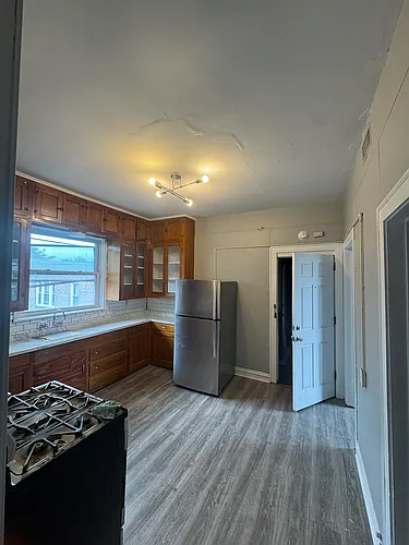 7250 S Langley Ave #2F Photo 1