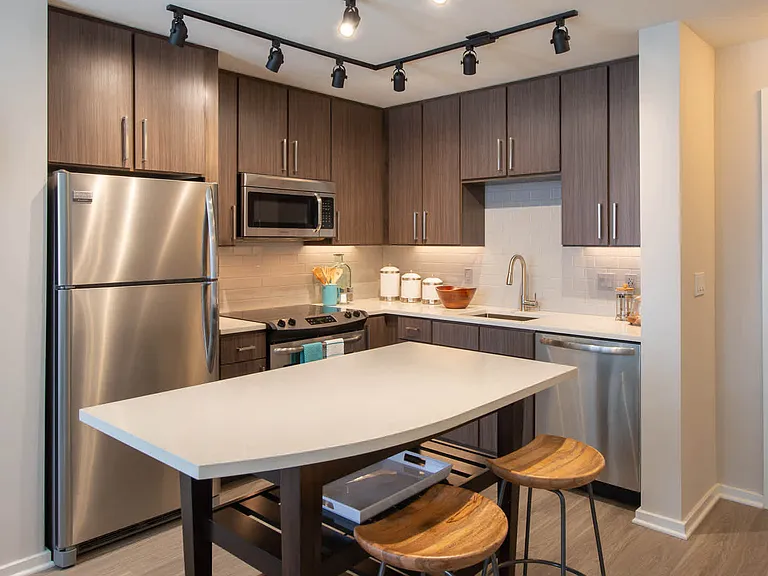 Kitchen with Quartz Countertops and Stainless Steel Appliances