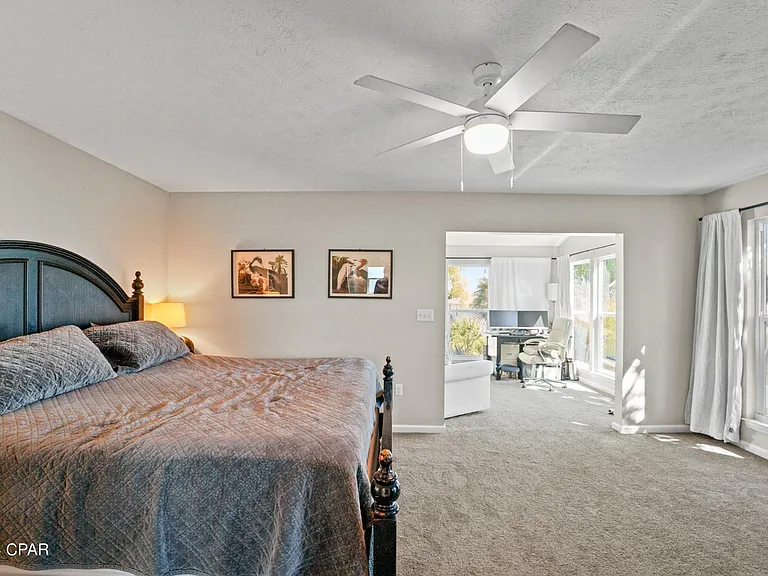 Master bedroom with additional sunroom. View of Gulf.