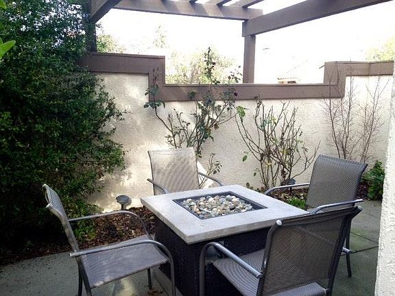 front patio with a fire pit