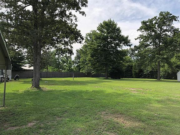 Backyard has a few mature shade trees, enjoy a nice quiet evening under the stars!