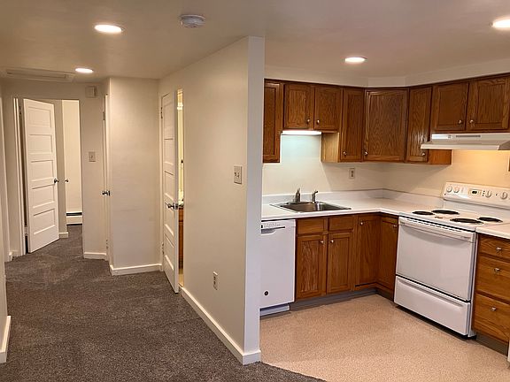Kitchen, hallway looking to bath/bedroom