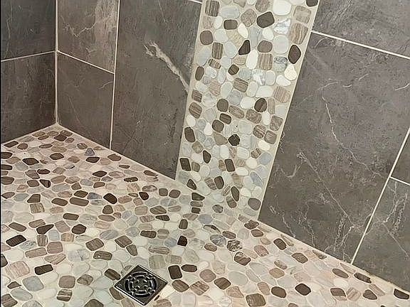 Tile in master shower 