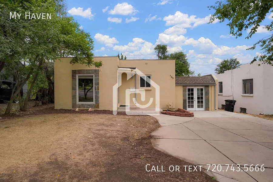 Freshly Updated 3-Bedroom Home with Flexible Living Space & Large Backyard in Denver! — Photo 2