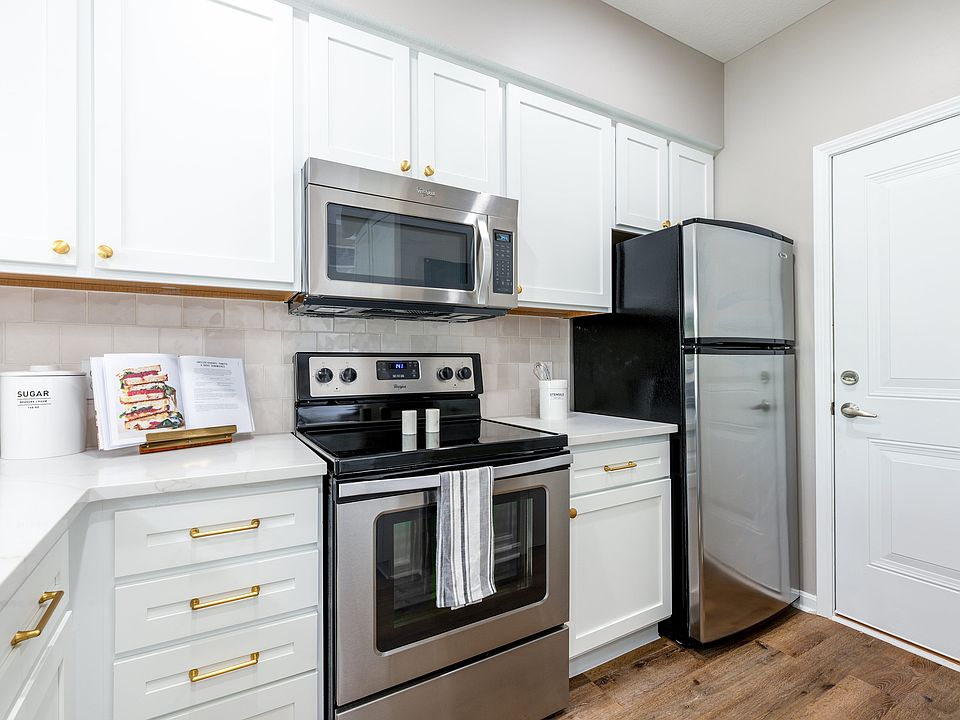 Experience culinary creativity in this sleek, modern kitchen.