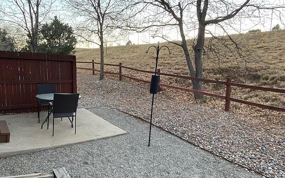 Private Porch off kitchen. No homes on top of hill.