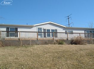 9277 Hogan Rd, Fenton, MI 48430