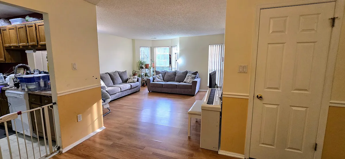 Large living room with lot of natural light, a big coat closet and an open layout. - 44 Cedar St